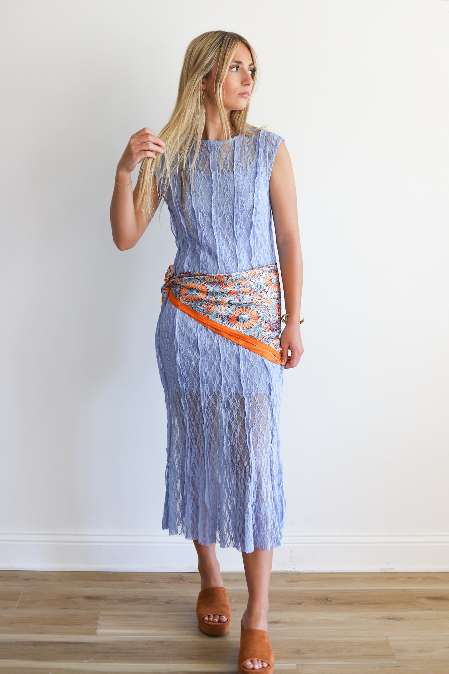 Girl wearing a lace blue midi dress
