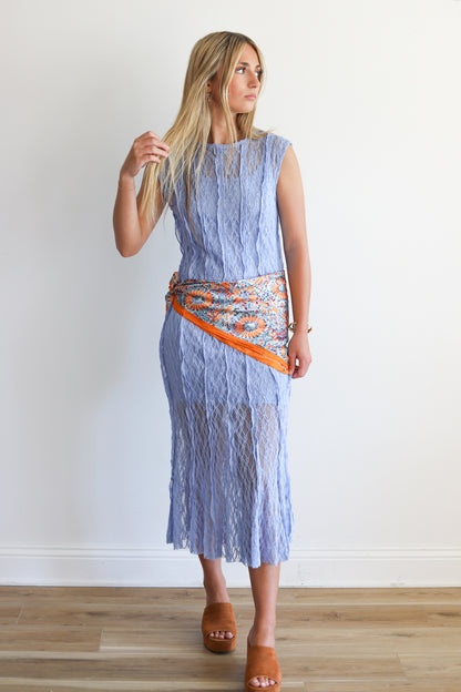 Girl wearing a lace blue midi dress